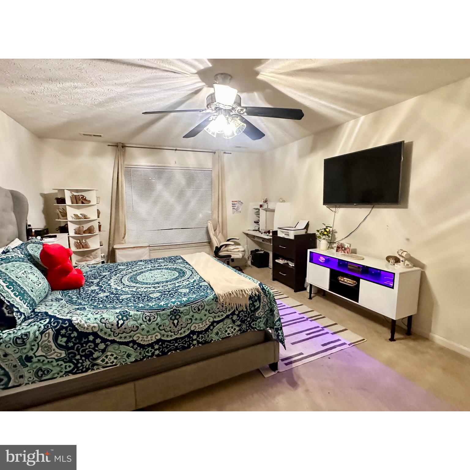 35391 Pheasant Ridge Road Locust Grove, VA 22508 - Photo 10 of 16 a living room with furniture and a flat screen tv