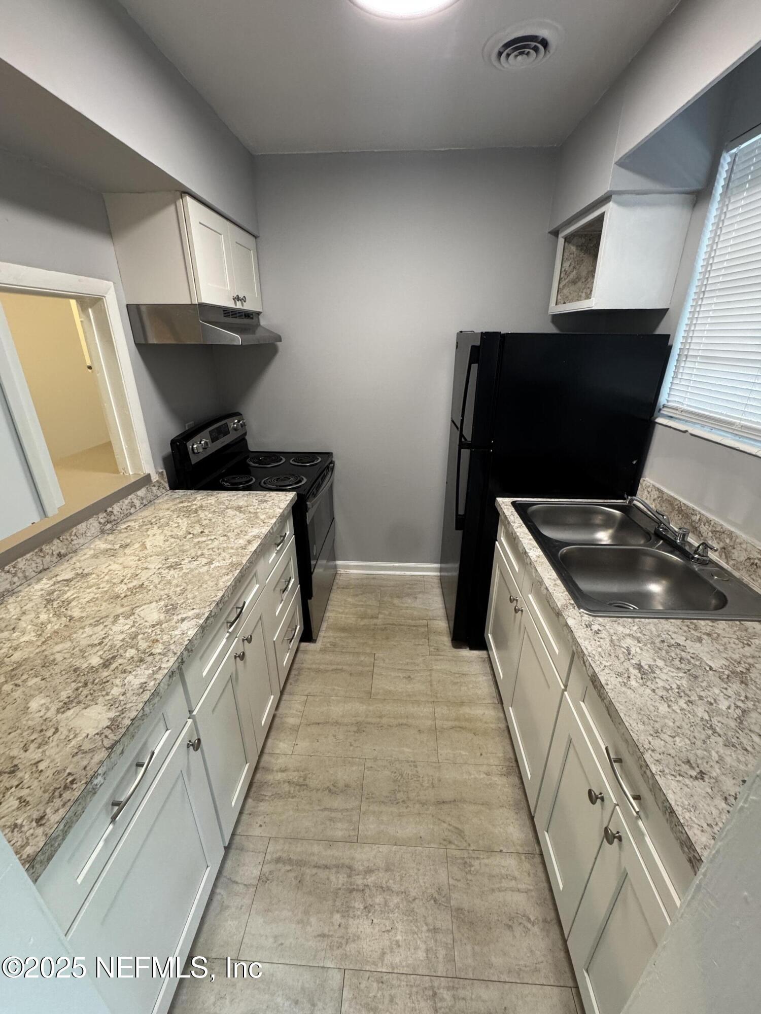 2441 Spring Park Road, Unit 47 Jacksonville, FL 32207 - Photo 4 of 10 IMG_6554