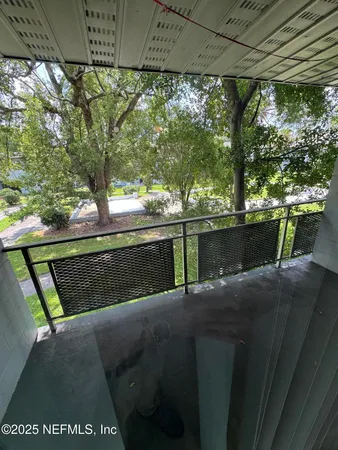a view of backyard with green space