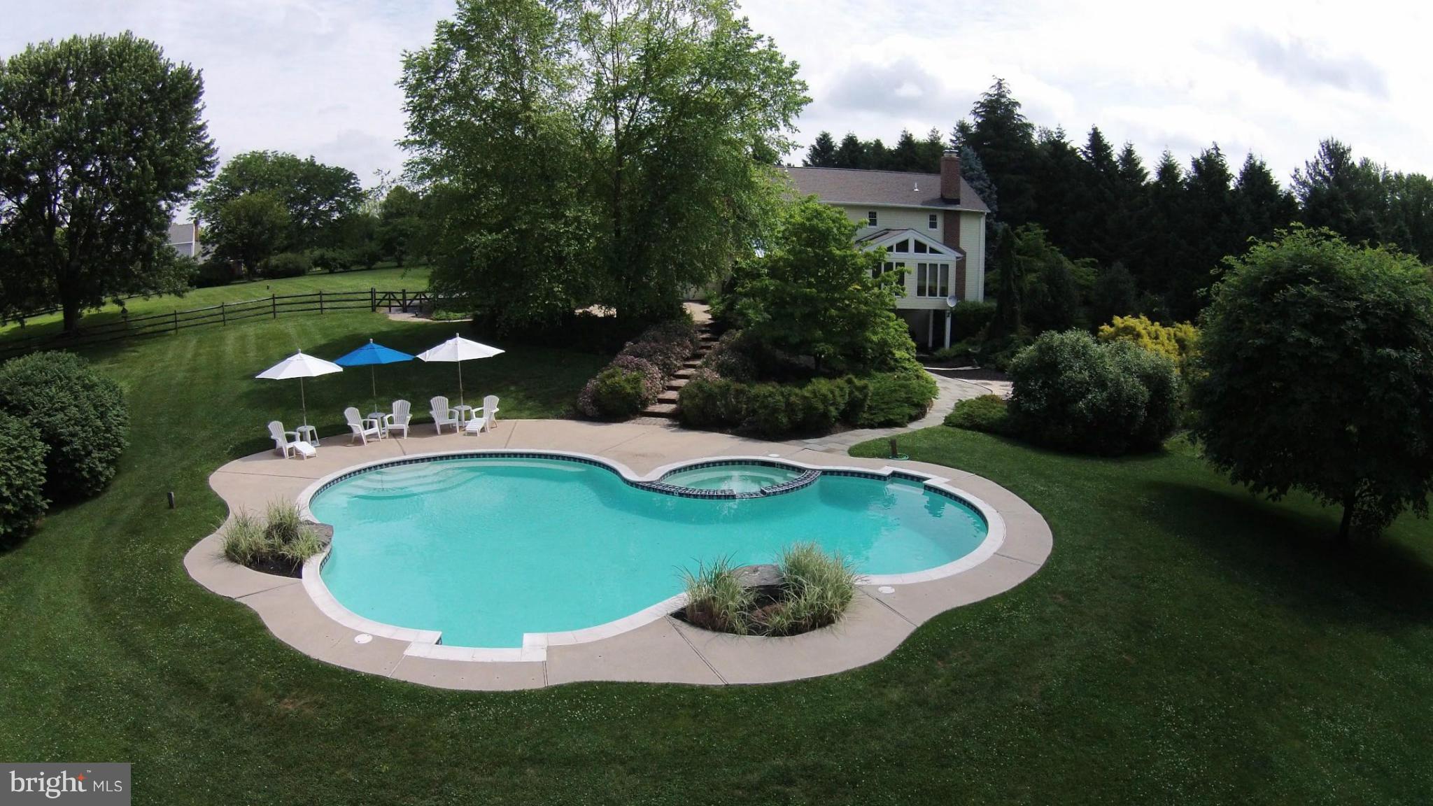 2807 Monkton Road Monkton, MD 21111 - Photo 2 of 30 a view of a swimming pool with a yard