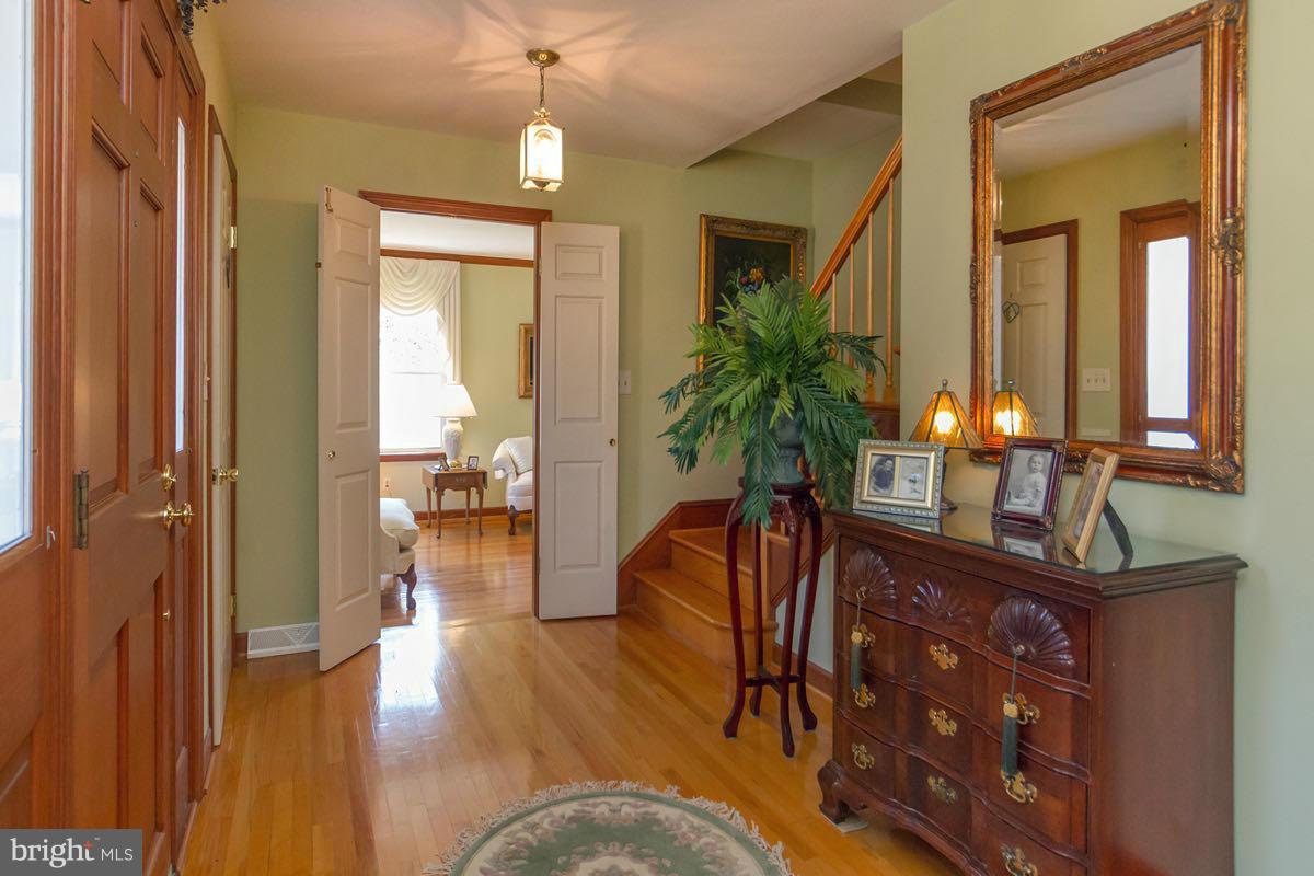 2807 Monkton Road Monkton, MD 21111 - Photo 11 of 30 a living room with furniture and a chandelier