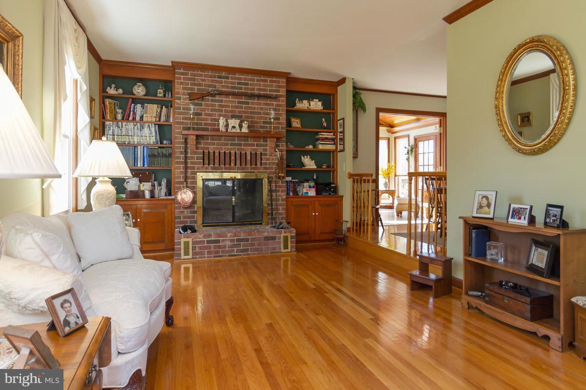2807 Monkton Road Monkton, MD 21111 - Photo 9 of 30 a living room with furniture and a wooden floor