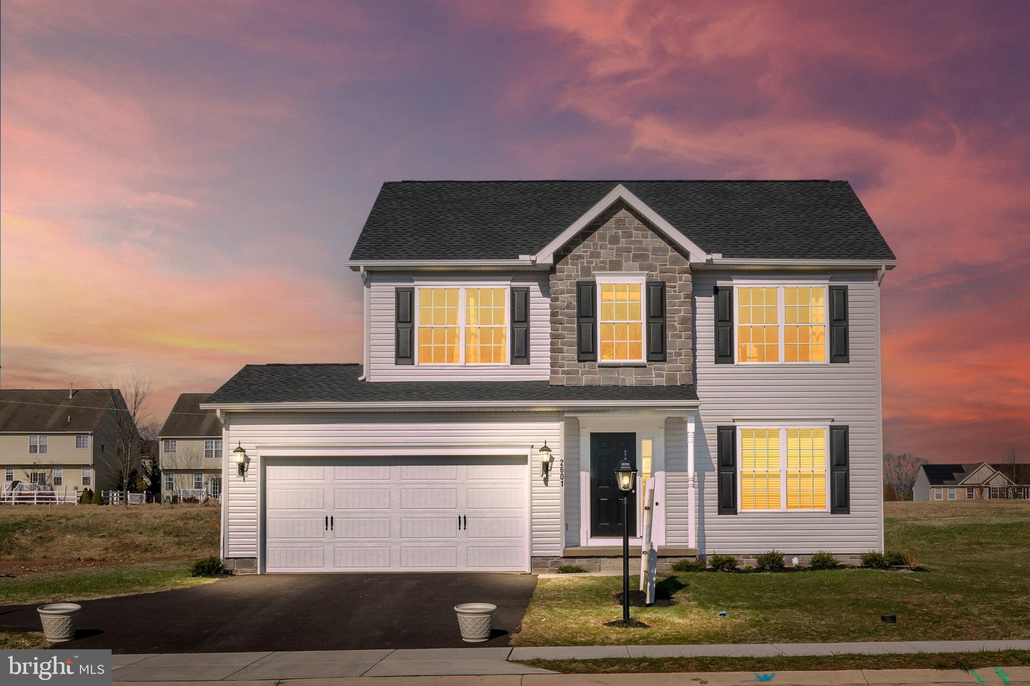 2601 Village Road Dover, PA 17315 - Photo 2 of 20 a front view of a house with a yard