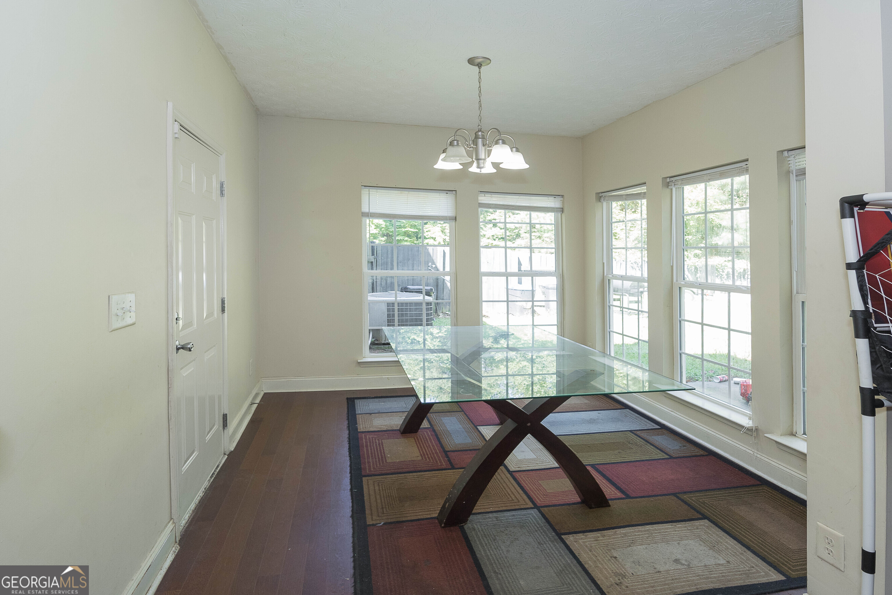 1231 Hillview Road Hampton, GA 30228 - Photo 11 of 45 a view of a room with furniture wooden floor and windows