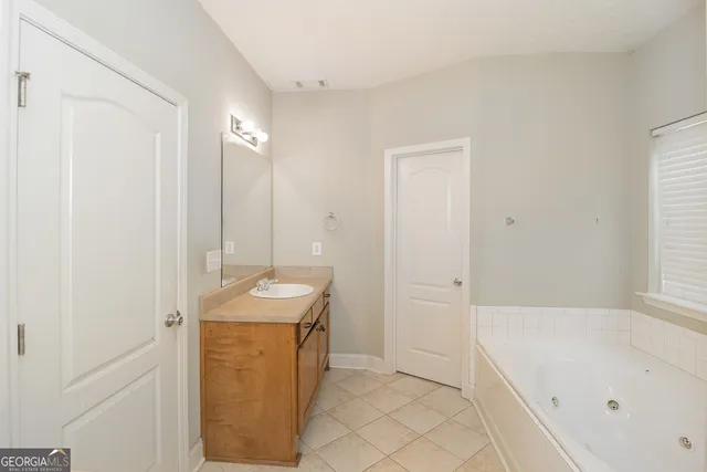 a bathroom with a sink and a tub