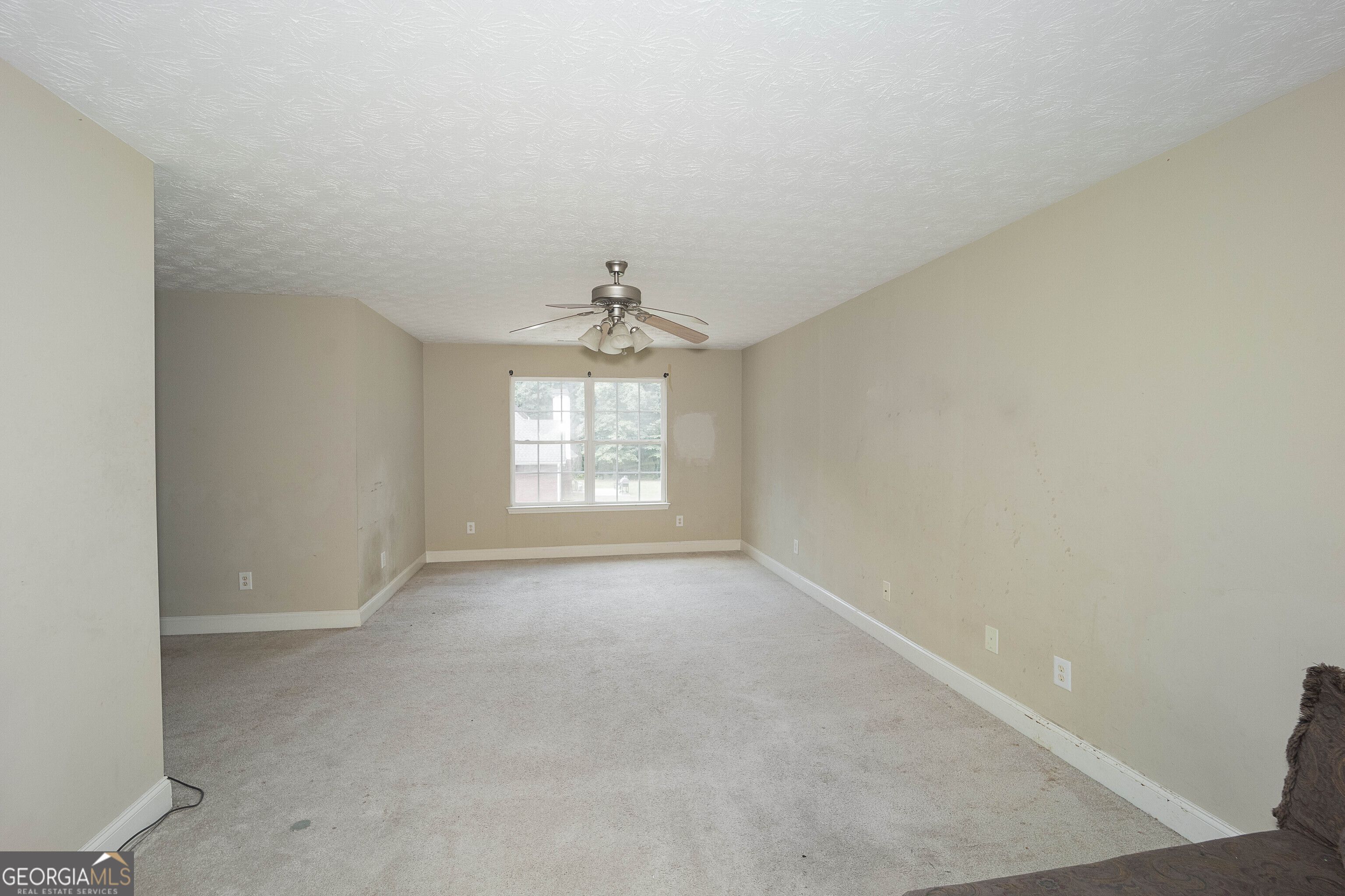1231 Hillview Road Hampton, GA 30228 - Photo 34 of 45 an empty room with a empty space and windows