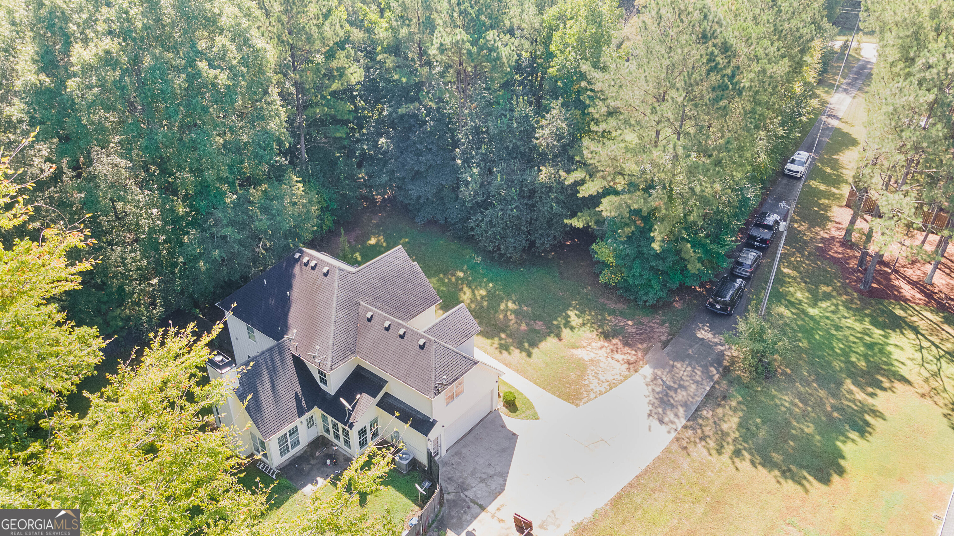 1231 Hillview Road Hampton, GA 30228 - Photo 42 of 45 an aerial view of residential house with outdoor space and swimming pool