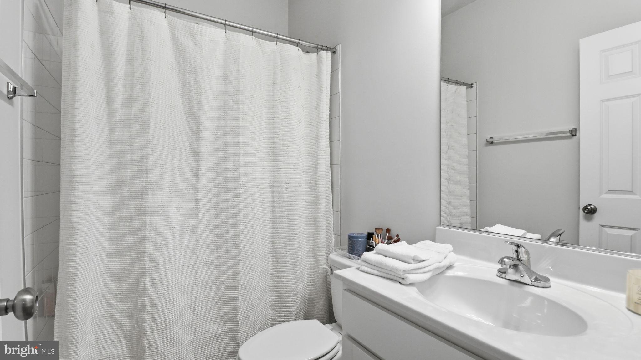 110 Edelweiss Way Stephenson, VA 22656 - Photo 27 of 45 Secondary hall full bathroom with shower tub combo