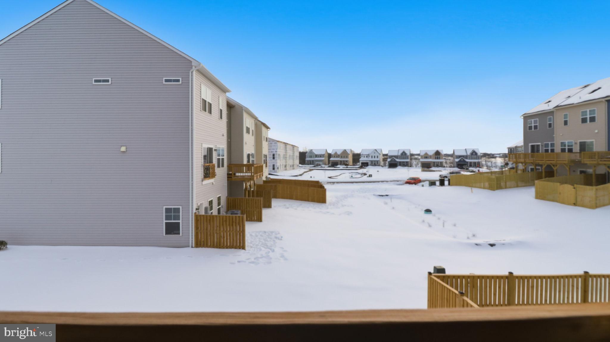 110 Edelweiss Way Stephenson, VA 22656 - Photo 4 of 45 Common space behind the townhome