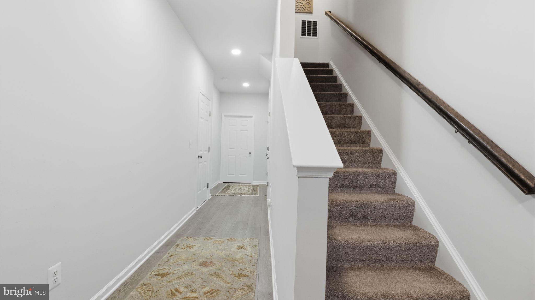 110 Edelweiss Way Stephenson, VA 22656 - Photo 5 of 45 Stairs to main level kitchen