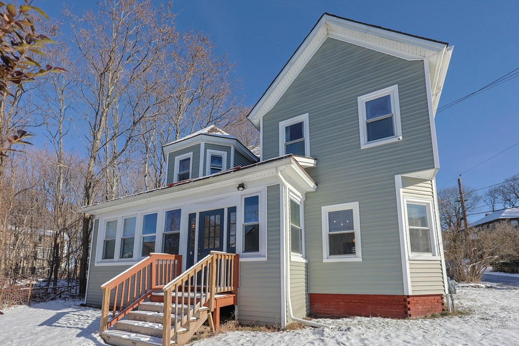 251 High Street Webster, MA 01570 - Photo 1 of 38 a front view of a house with a porch
