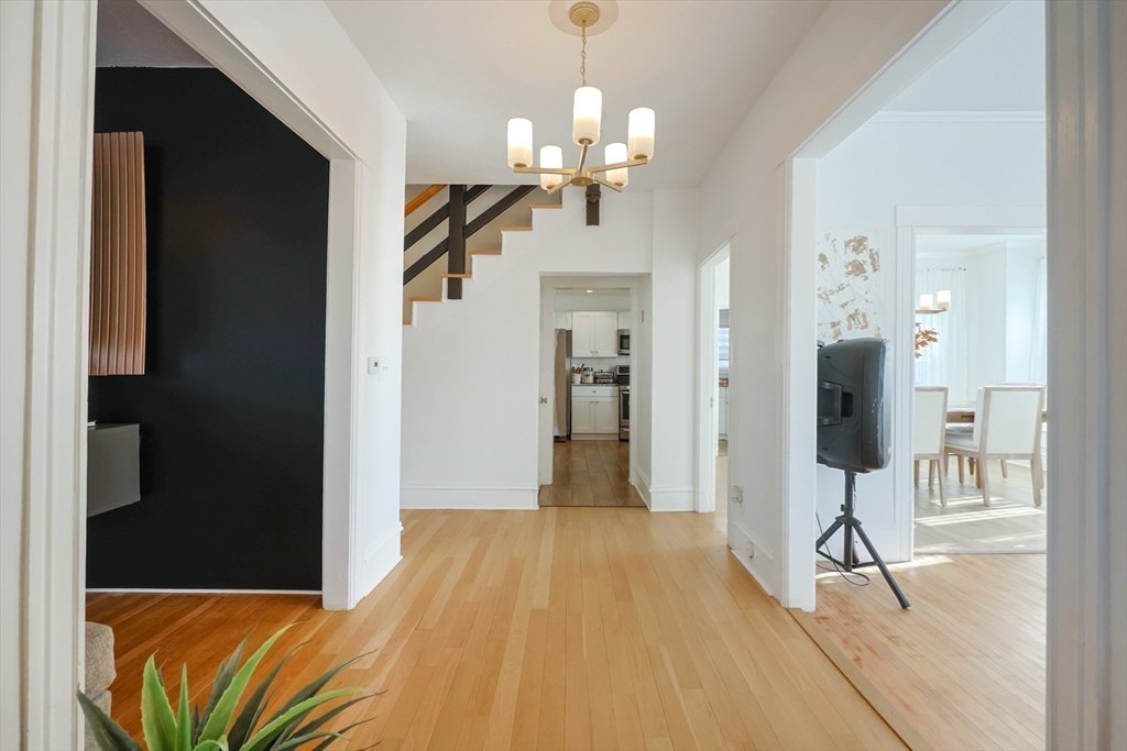 251 High Street Webster, MA 01570 - Photo 11 of 38 a view of a livingroom with a chandelier