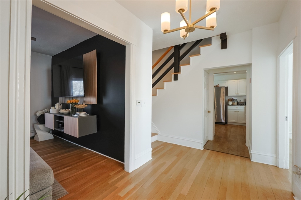 251 High Street Webster, MA 01570 - Photo 12 of 38 a view of a living room with wooden floor