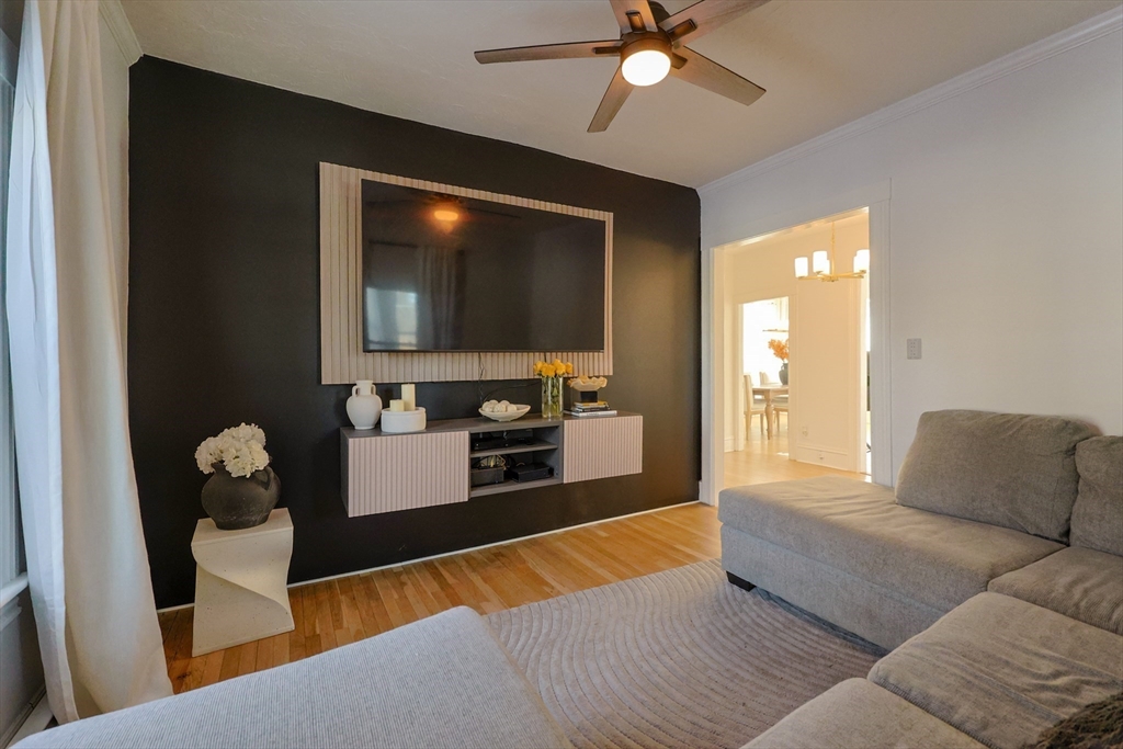 251 High Street Webster, MA 01570 - Photo 14 of 38 a living room with furniture and a flat screen tv