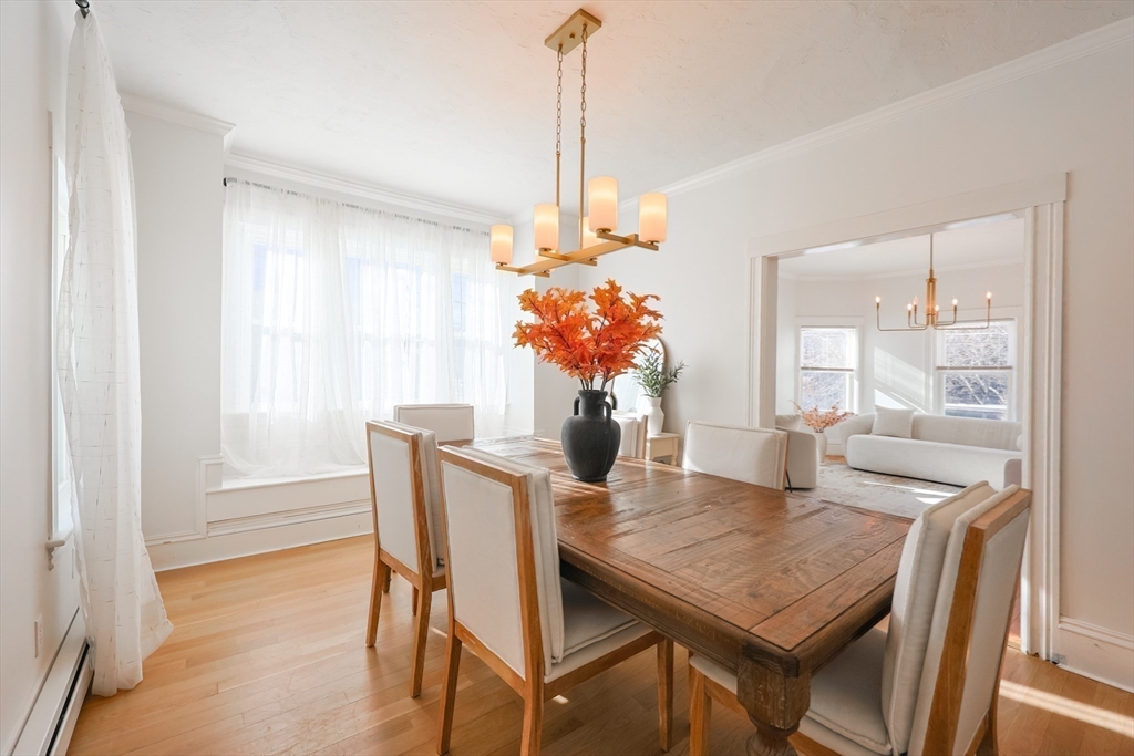 251 High Street Webster, MA 01570 - Photo 18 of 38 a view of a dining room with furniture window and wooden floor