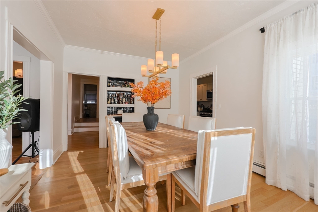 251 High Street Webster, MA 01570 - Photo 19 of 38 a view of a dining room with furniture and wooden floor