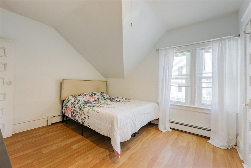 251 High Street Webster, MA 01570 - Photo 30 of 38 a bedroom with a bed and a window
