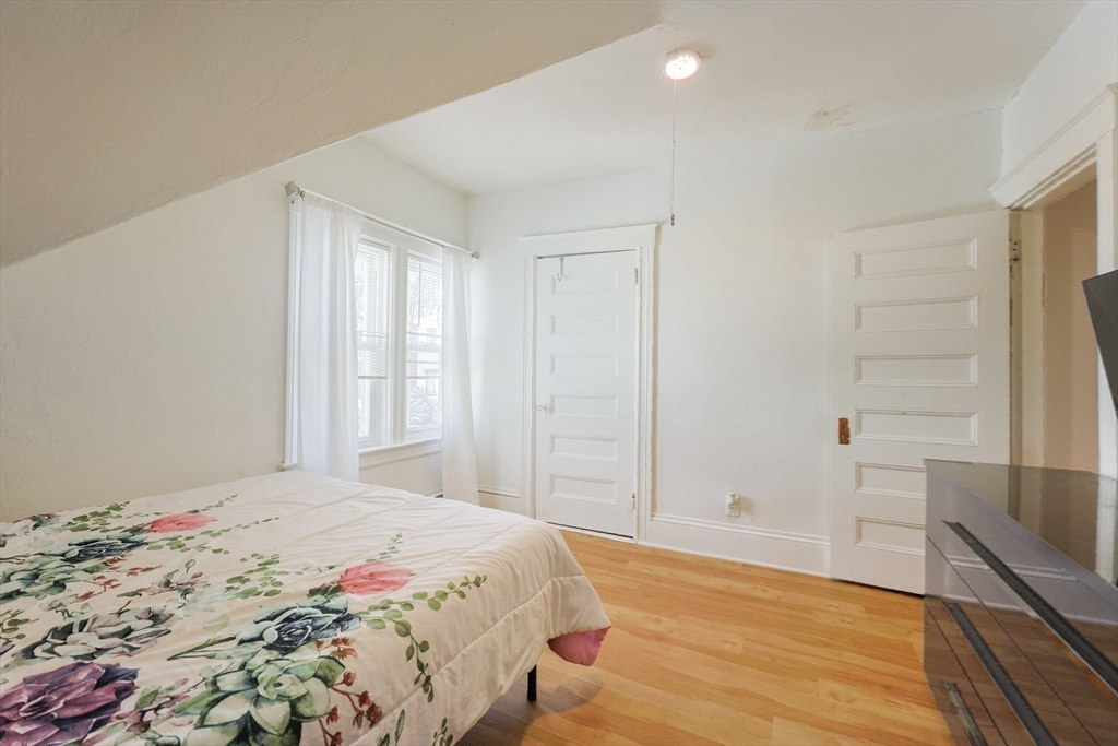251 High Street Webster, MA 01570 - Photo 31 of 38 a bedroom with a bed and a rug