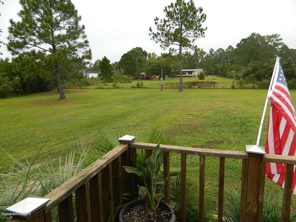 4719 Pine Needle Road Mims, FL 32754 - Photo 22 of 24 Front Porch to Yard View