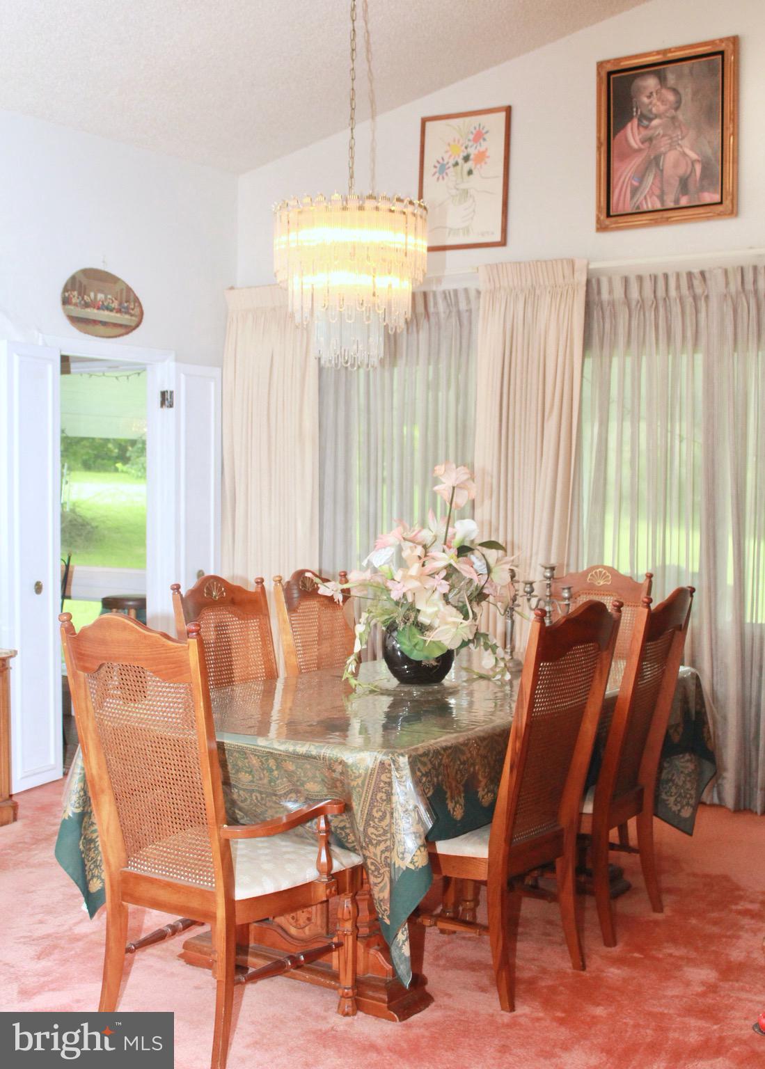 8301 Cobden Road Glenside, PA 19038 - Photo 11 of 32 dining room with vaulted ceiling