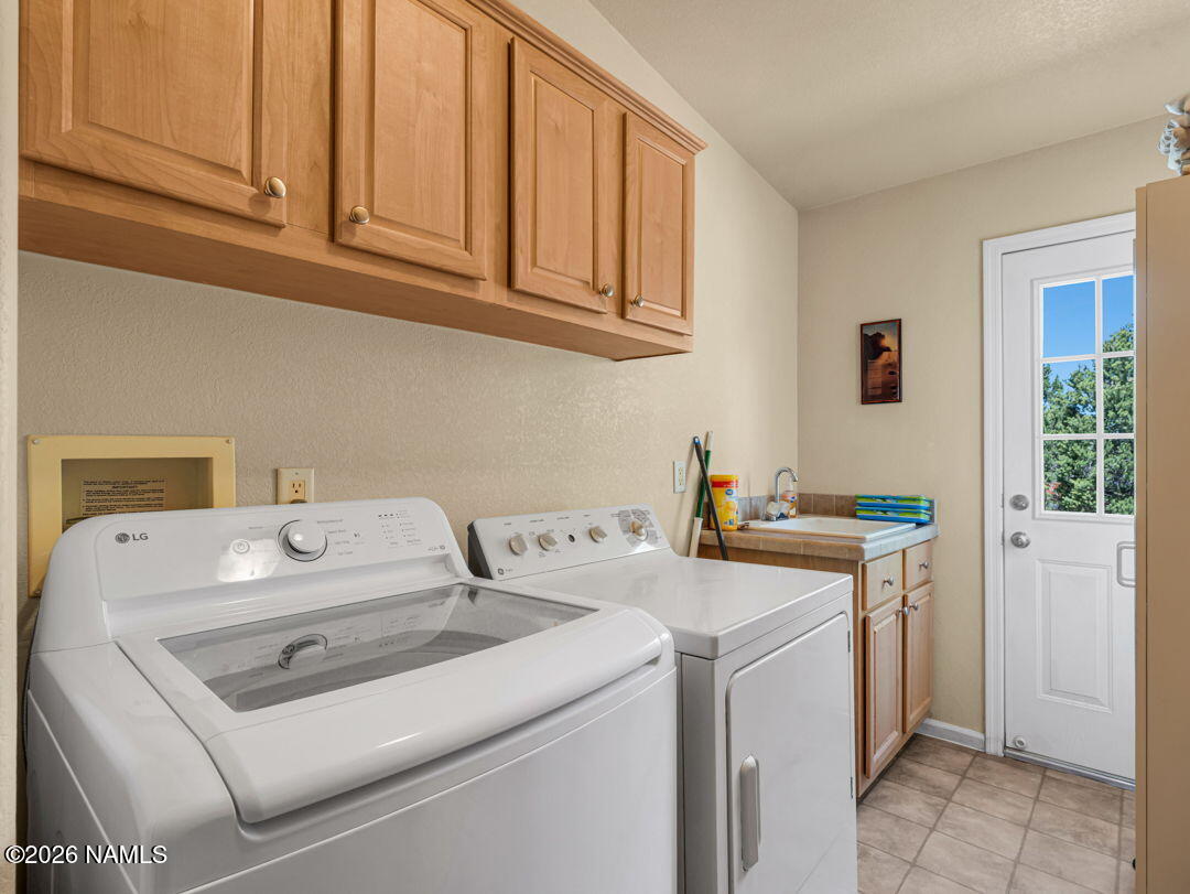 7538 Iron Buffalo Road Williams, AZ 86046 - Photo 22 of 30 a utility room with dryer and washer