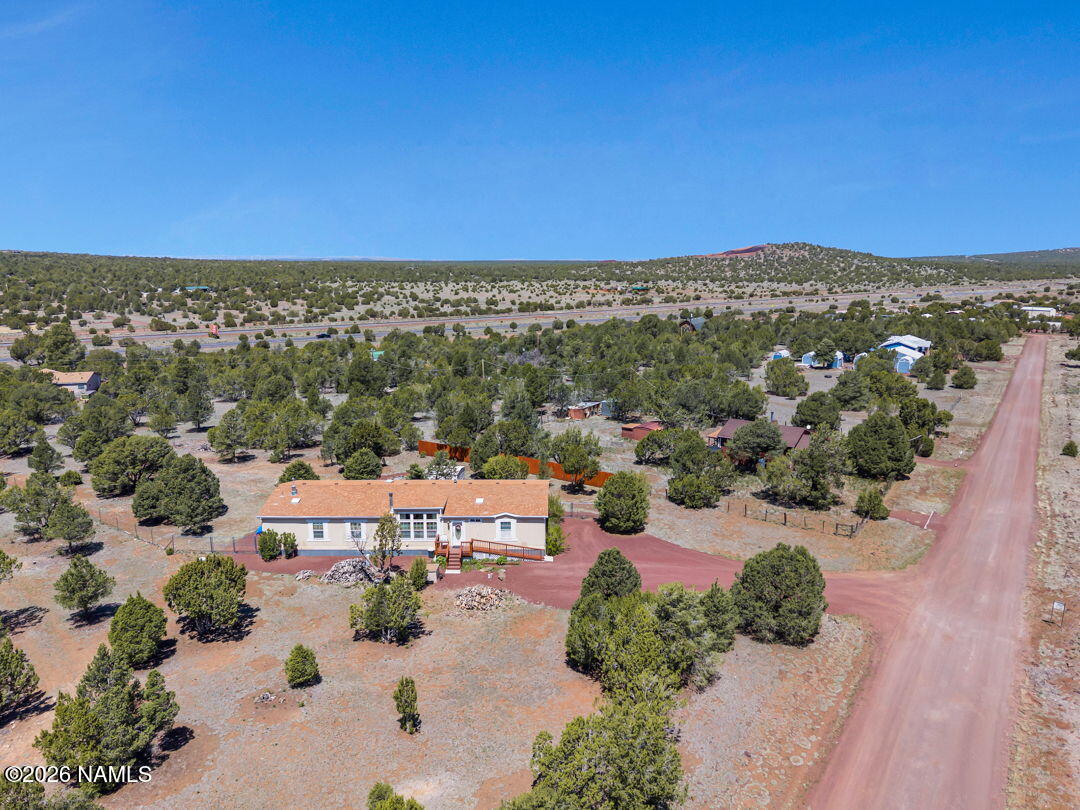 7538 Iron Buffalo Road Williams, AZ 86046 - Photo 30 of 30 an aerial view of residential houses with outdoor space