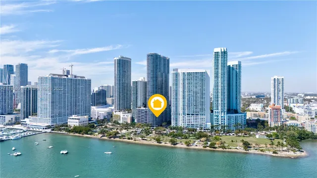 a view of a city with tall buildings