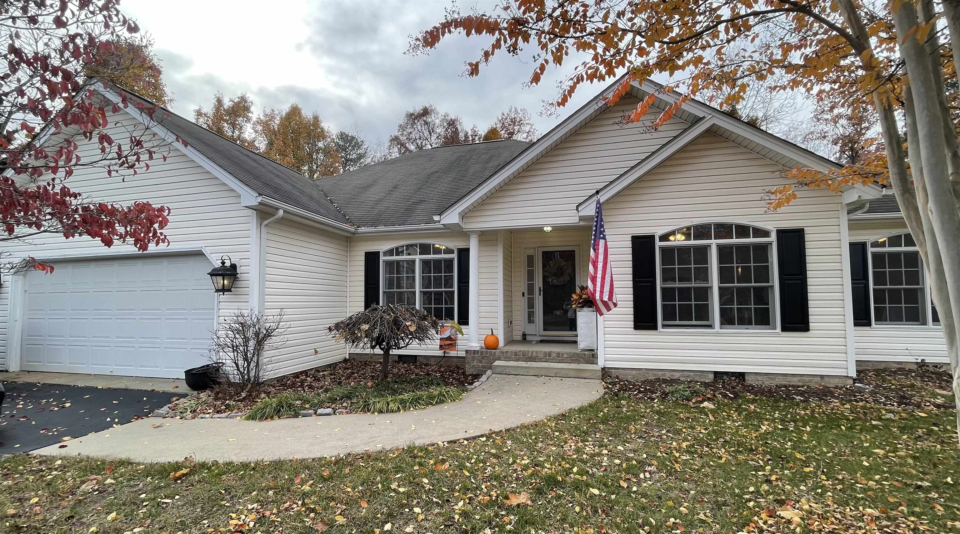 111 Rutherford Lane Stuarts Draft, VA 24477 - Photo 1 of 45 a front view of a house with garden