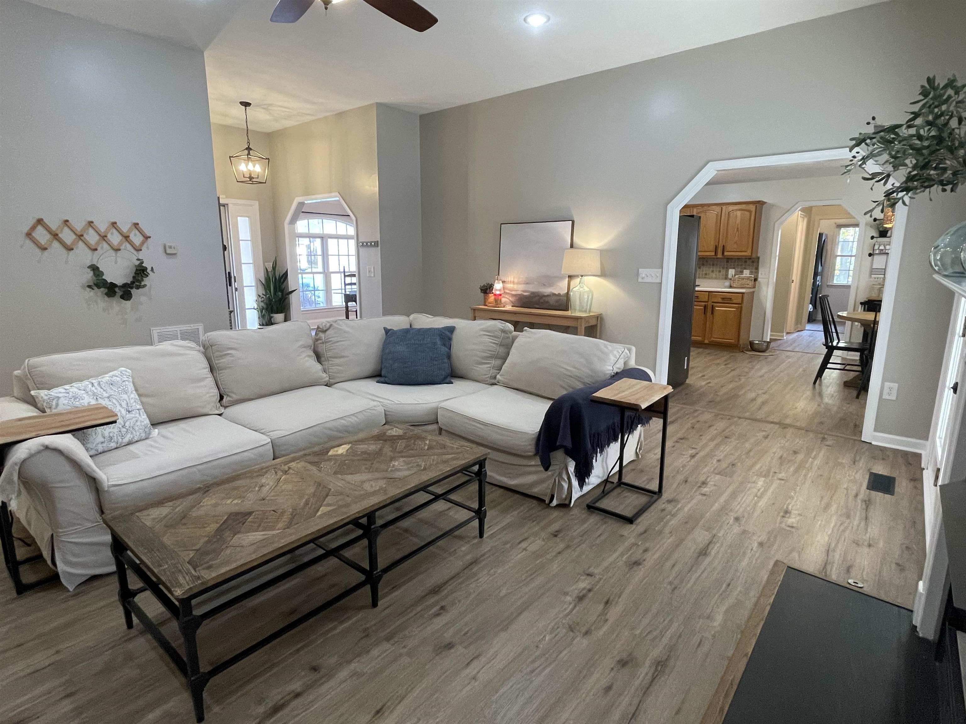 111 Rutherford Lane Stuarts Draft, VA 24477 - Photo 13 of 45 a living room with furniture and wooden floor