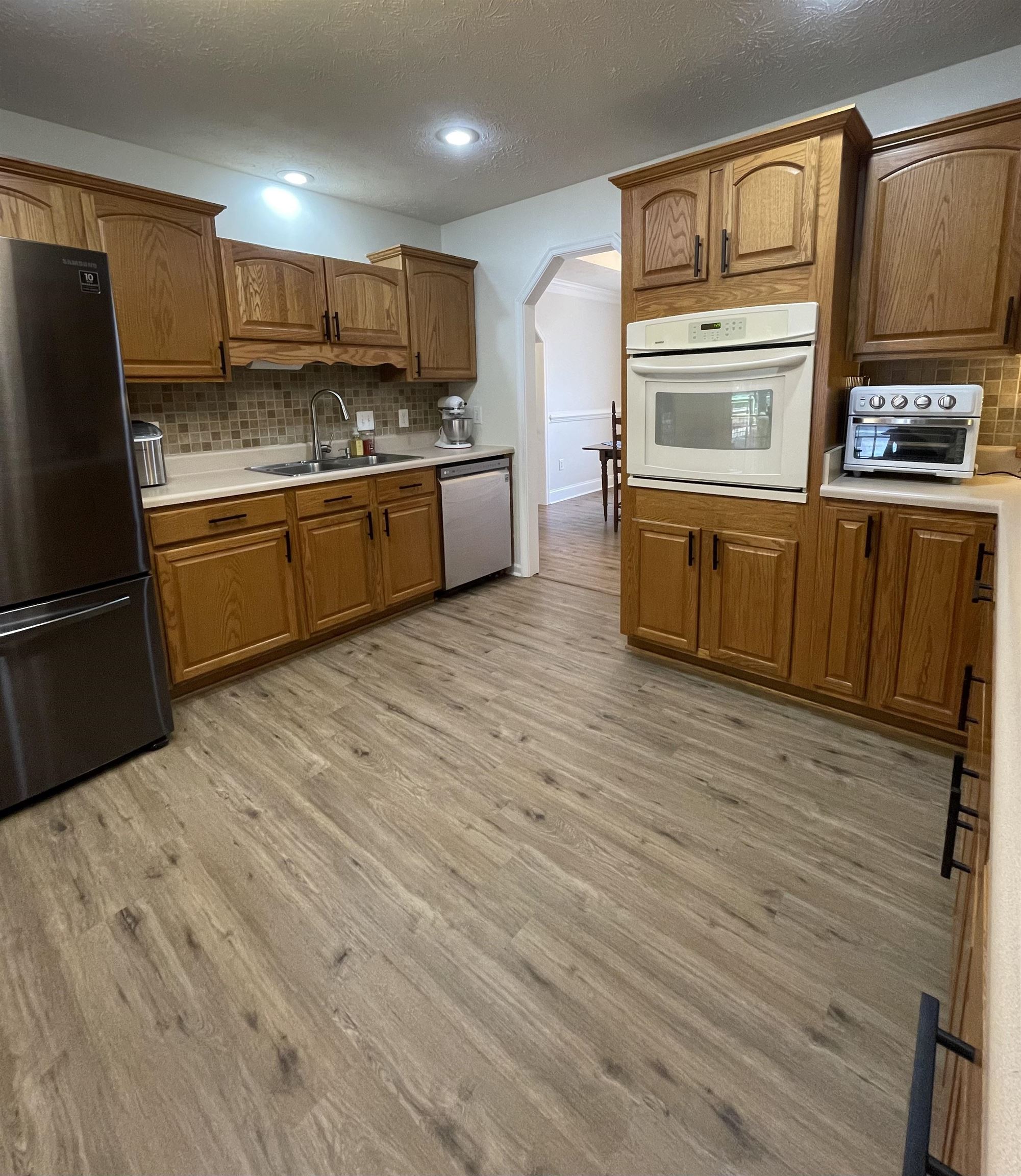 111 Rutherford Lane Stuarts Draft, VA 24477 - Photo 19 of 45 a kitchen with stainless steel appliances a refrigerator and a stove top oven