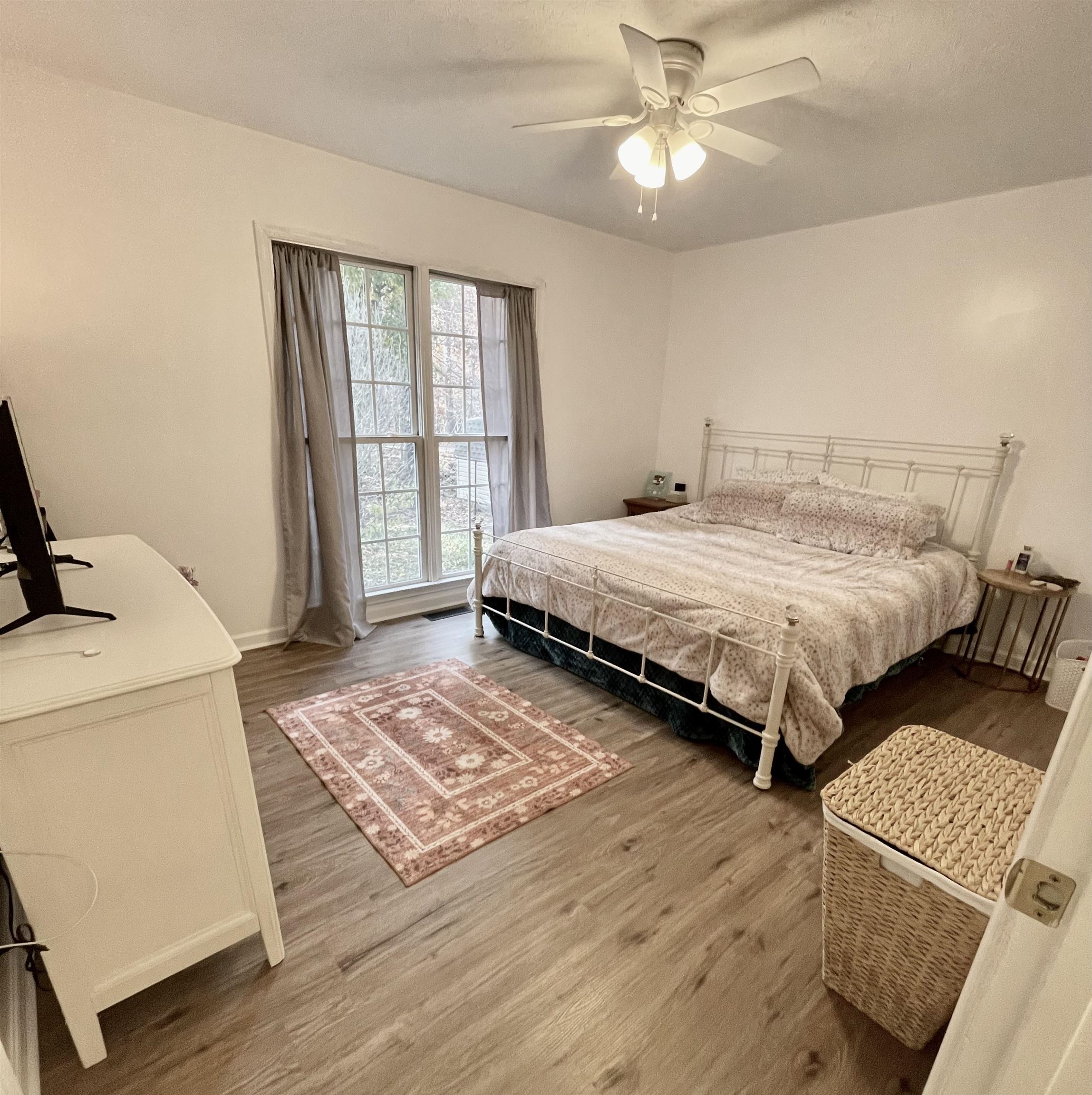 111 Rutherford Lane Stuarts Draft, VA 24477 - Photo 28 of 45 a bedroom with two beds and a window