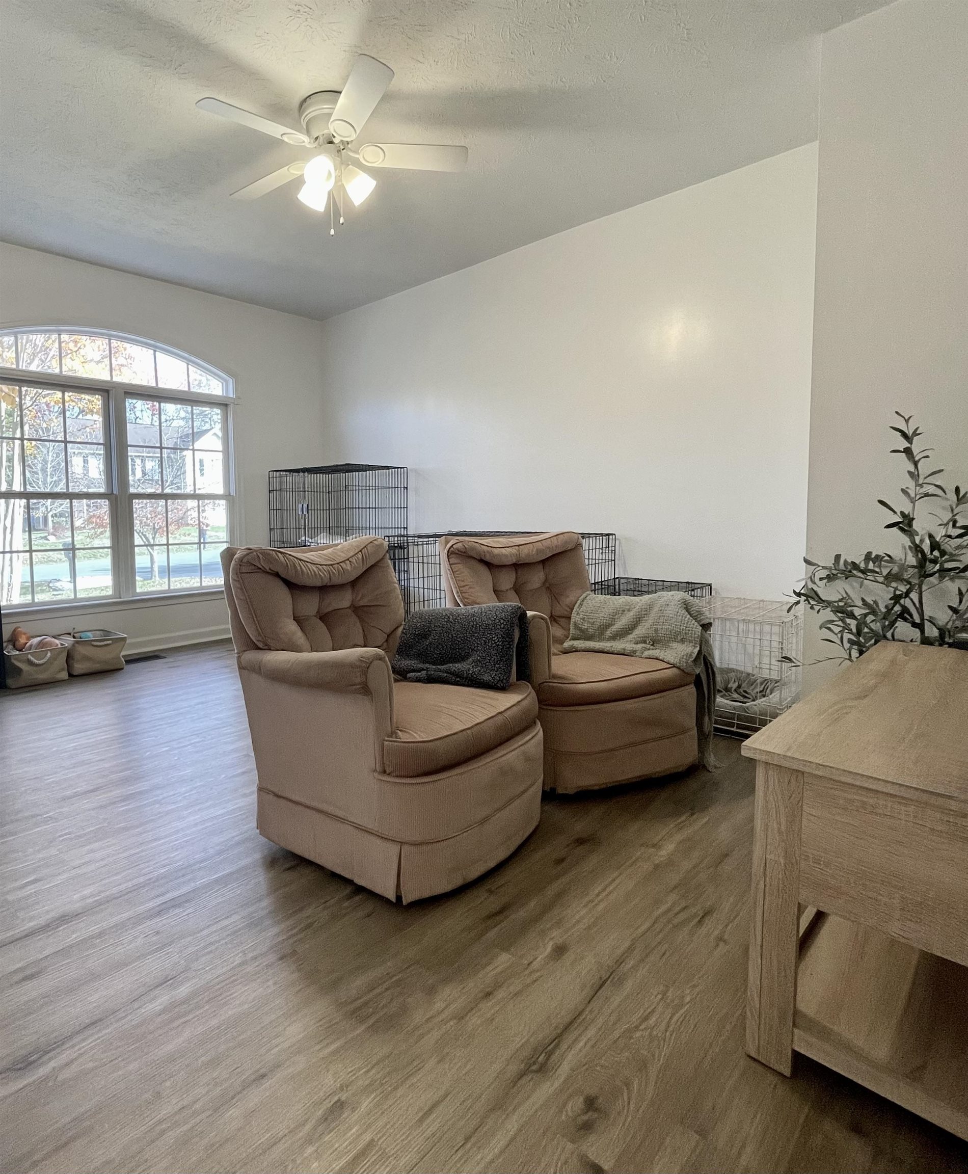 111 Rutherford Lane Stuarts Draft, VA 24477 - Photo 29 of 45 a living room with furniture and a wooden floor