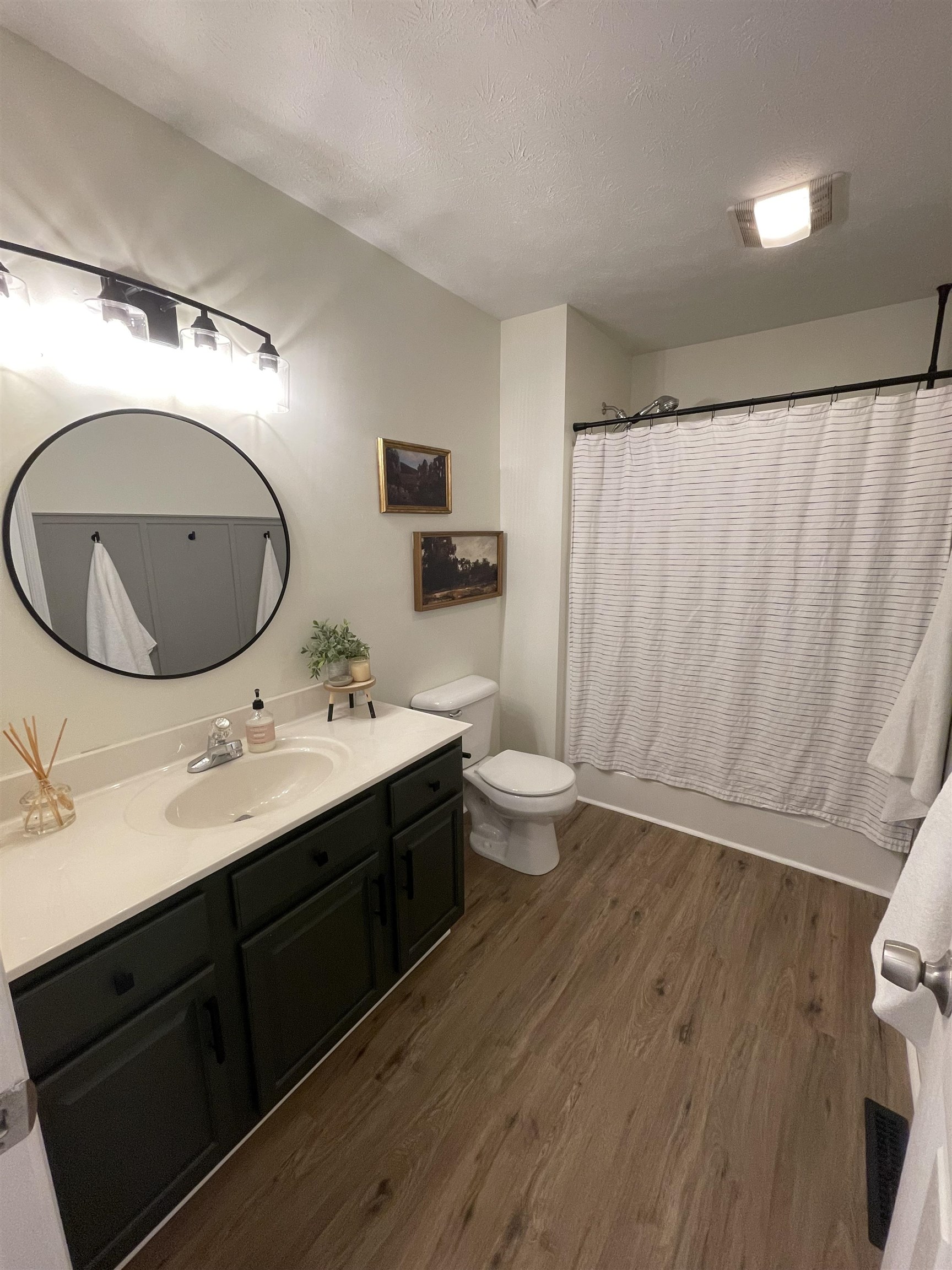 111 Rutherford Lane Stuarts Draft, VA 24477 - Photo 31 of 45 a bathroom with a sink and a mirror