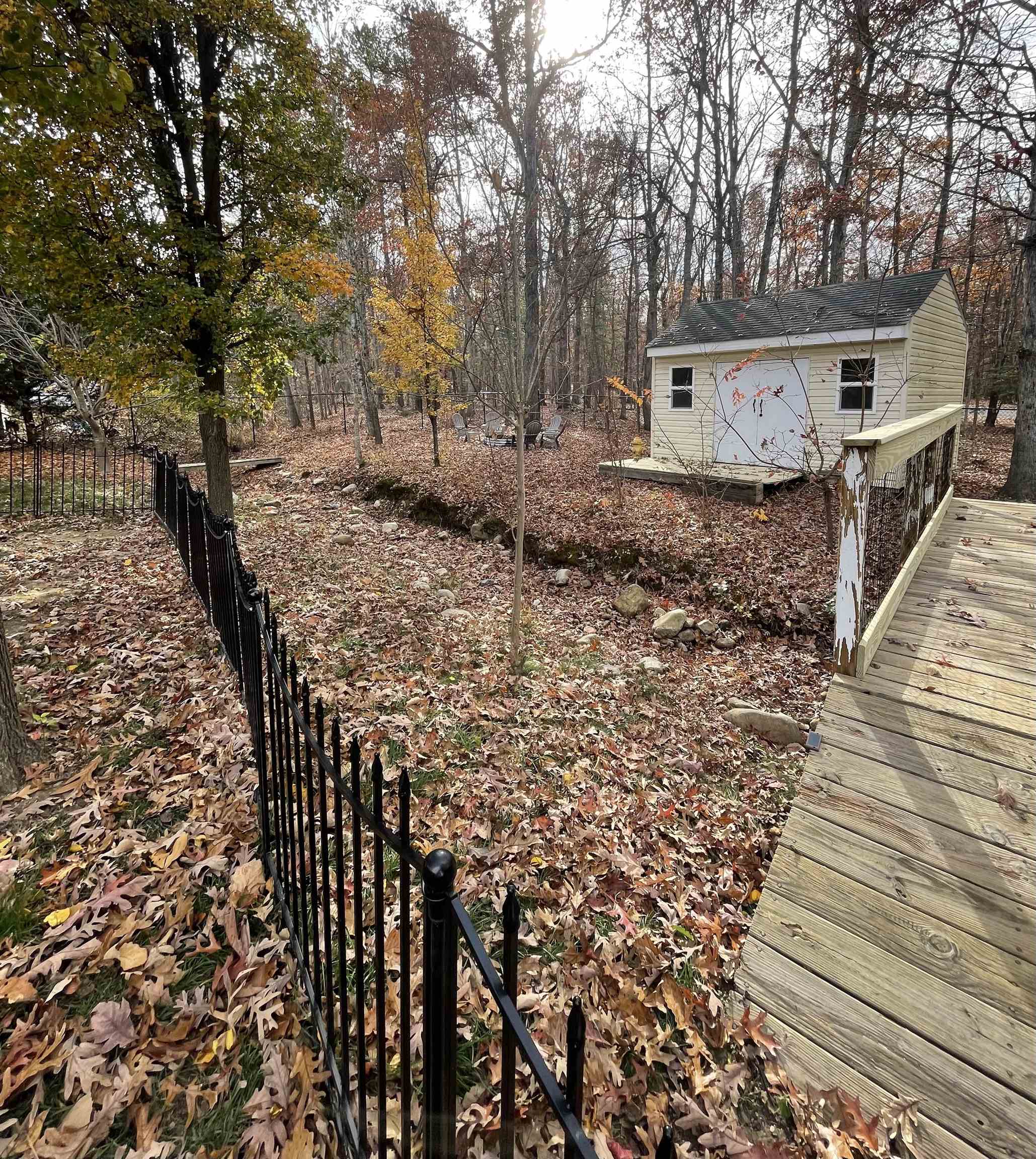 111 Rutherford Lane Stuarts Draft, VA 24477 - Photo 42 of 45 a view of house with backyard and trees