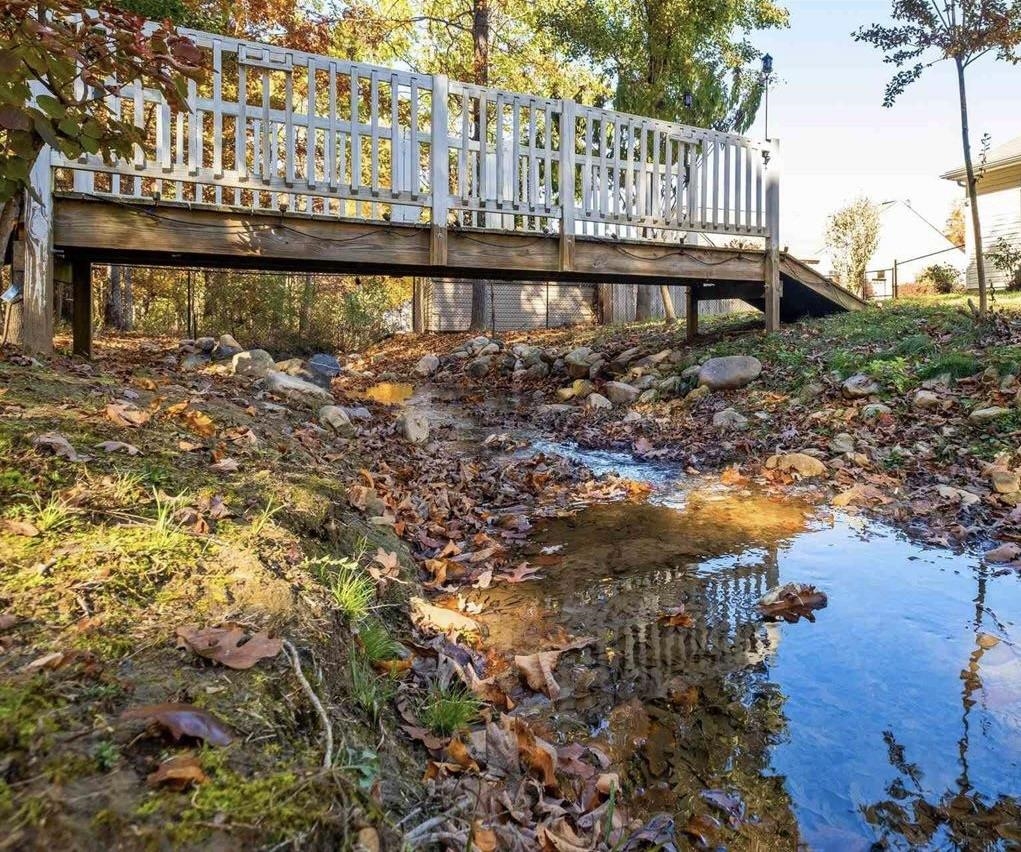 111 Rutherford Lane Stuarts Draft, VA 24477 - Photo 43 of 45 a view of a small yard with wooden fence
