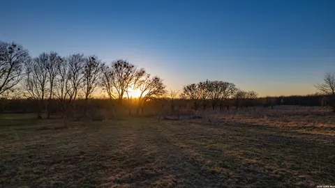 a view of a wrought iron fences in front of house