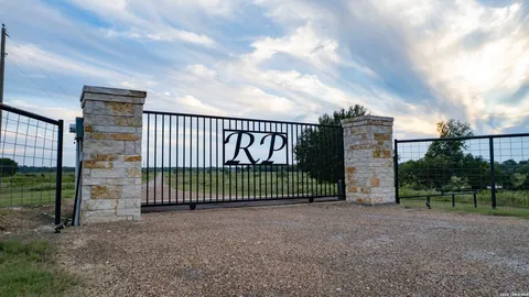 a backyard of a house with lots of green space and fog