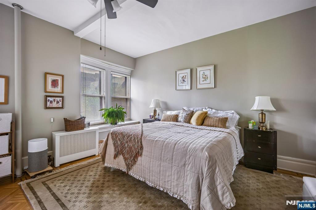 57 Union Street, Unit C4021 Montclair, NJ 07042 - Photo 17 of 20 a bed room with a bed and a couch