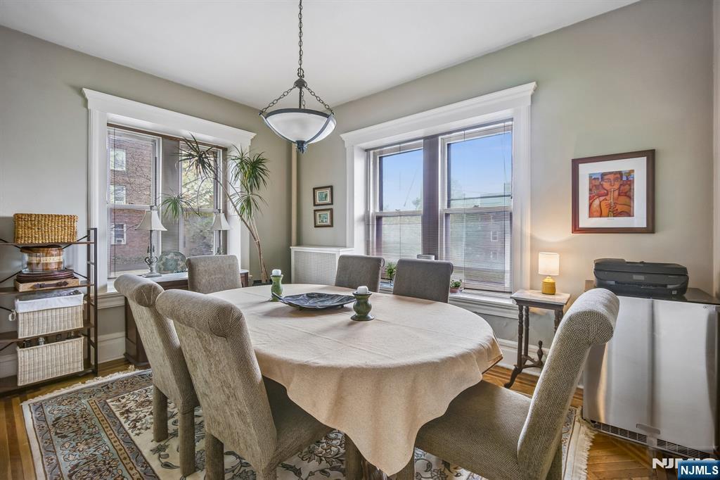 57 Union Street, Unit C4021 Montclair, NJ 07042 - Photo 6 of 20 a view of a dining room with furniture window and outside view