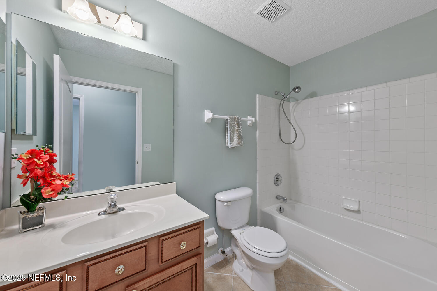 9317 Beresford Court Jacksonville, FL 32244 - Photo 34 of 55 a bathroom with a sink toilet and shower