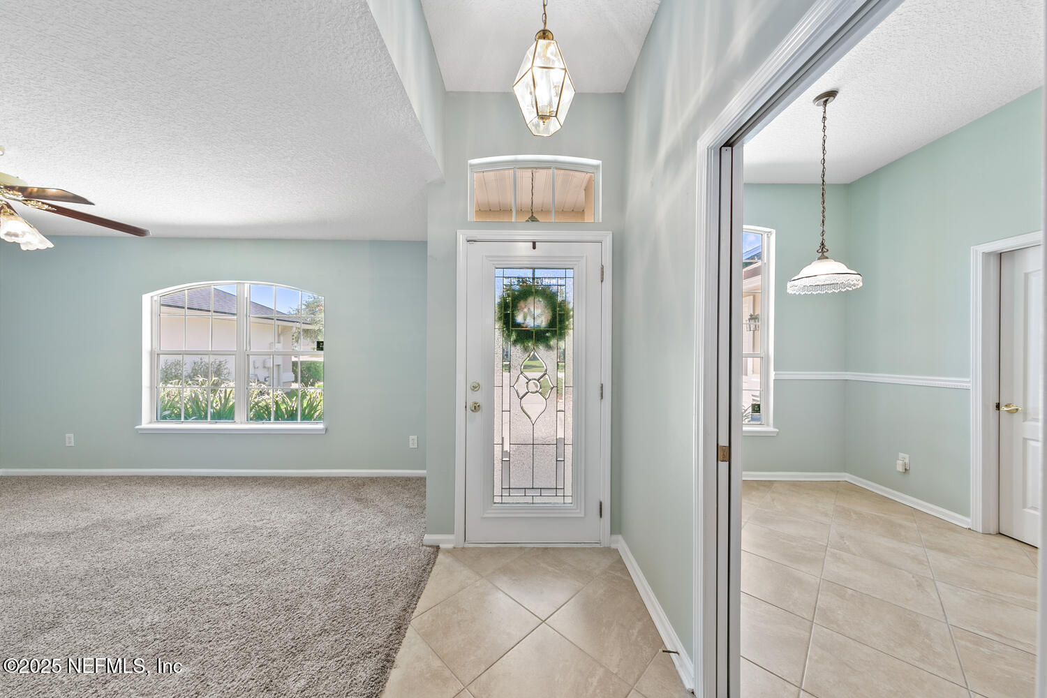 9317 Beresford Court Jacksonville, FL 32244 - Photo 5 of 55 a view of an entryway with wooden floor