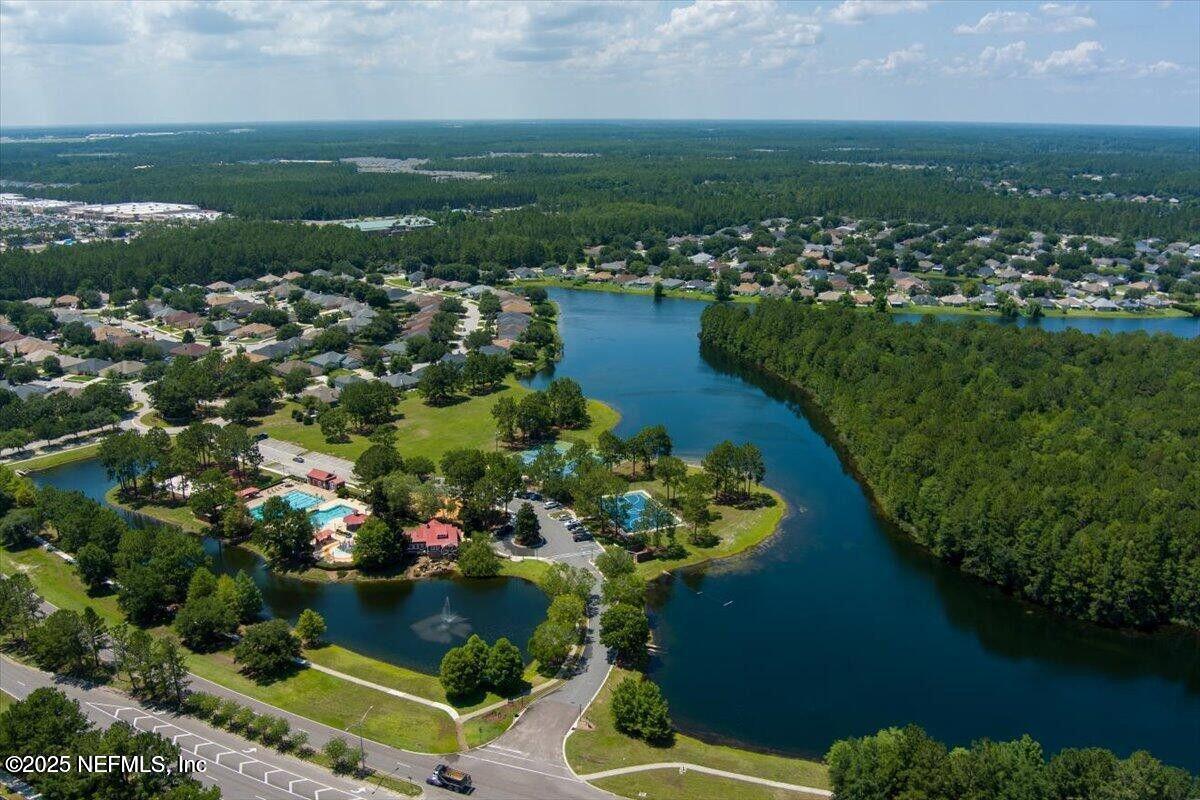 9317 Beresford Court Jacksonville, FL 32244 - Photo 51 of 55 a view of a lake with a city