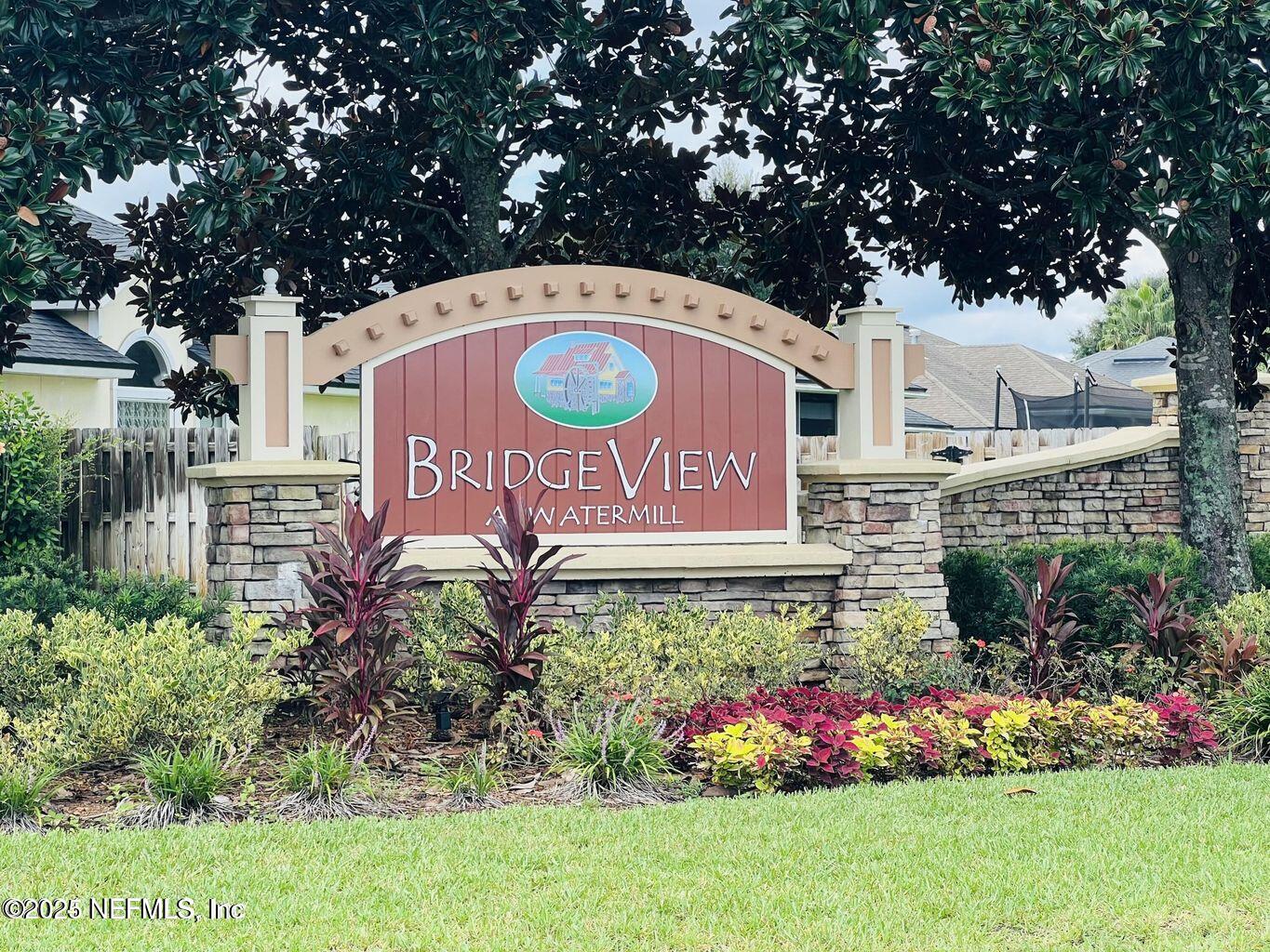 9317 Beresford Court Jacksonville, FL 32244 - Photo 55 of 55 a sign that is sitting in front of flowers