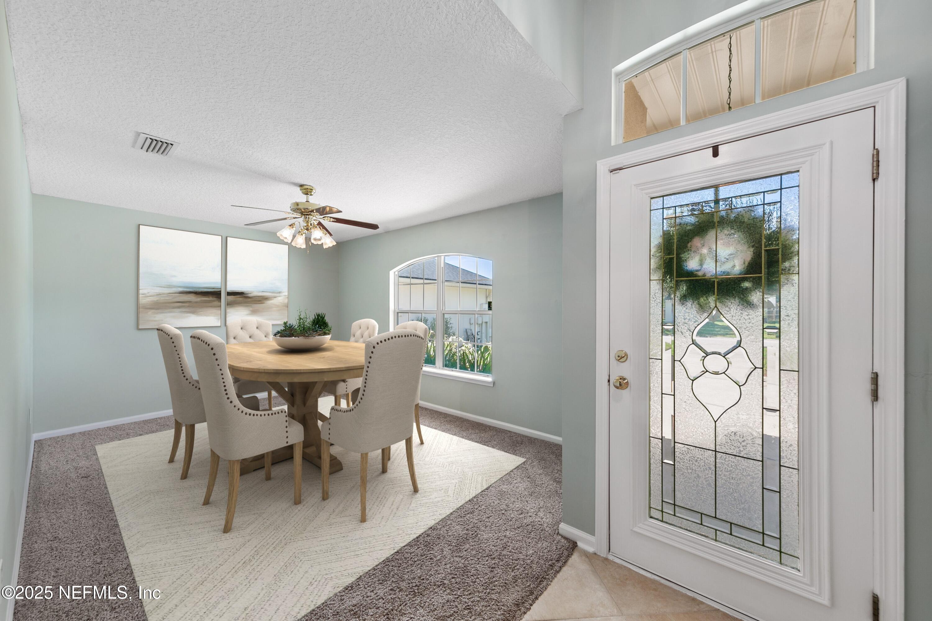 9317 Beresford Court Jacksonville, FL 32244 - Photo 7 of 55 a dining room with furniture and window