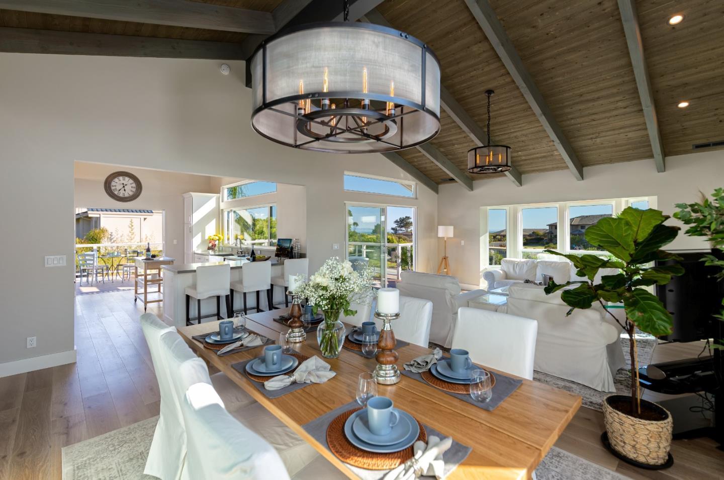150 Vía Soderini Aptos, CA 95003 - Photo 12 of 36 a dining room with furniture and a potted plant