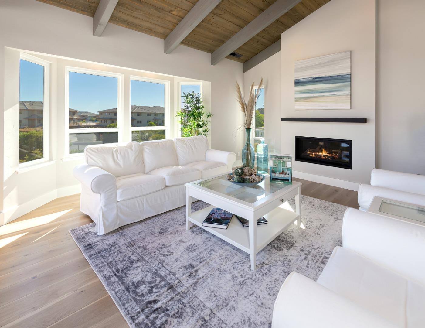 150 Vía Soderini Aptos, CA 95003 - Photo 13 of 36 a living room with furniture and a fireplace