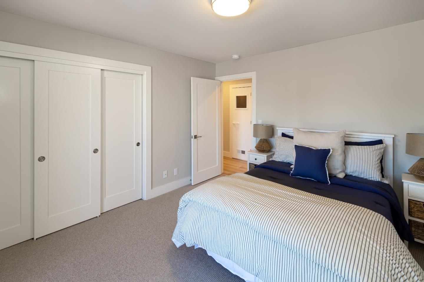 150 Vía Soderini Aptos, CA 95003 - Photo 26 of 36 a bedroom with a bed and window