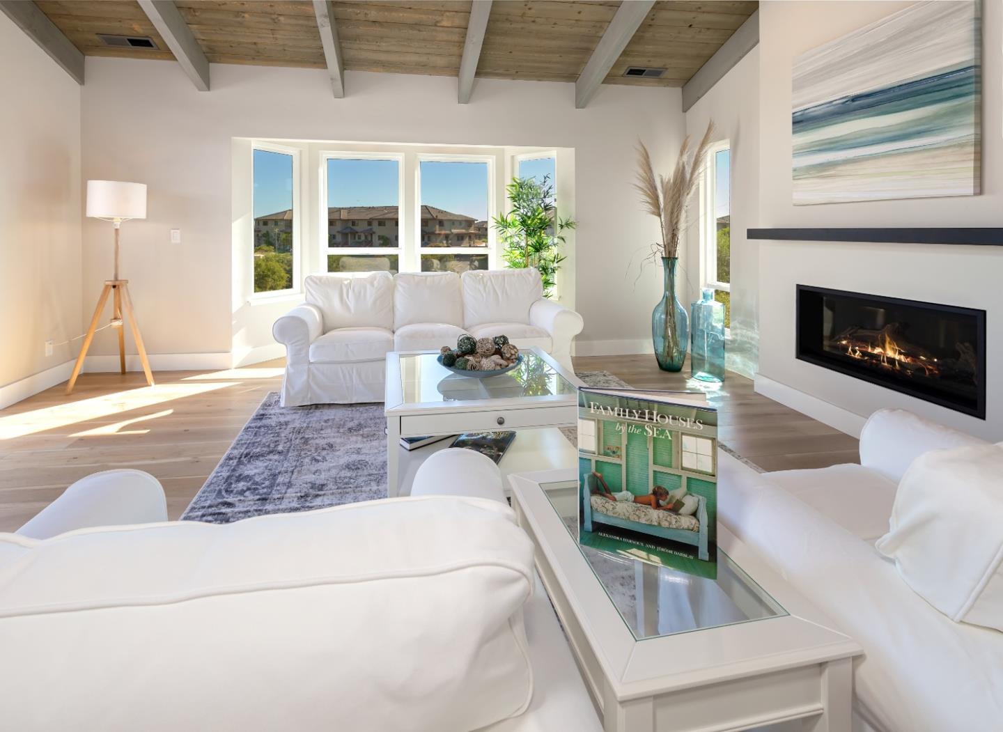 150 Vía Soderini Aptos, CA 95003 - Photo 7 of 36 a living room with furniture and a fireplace