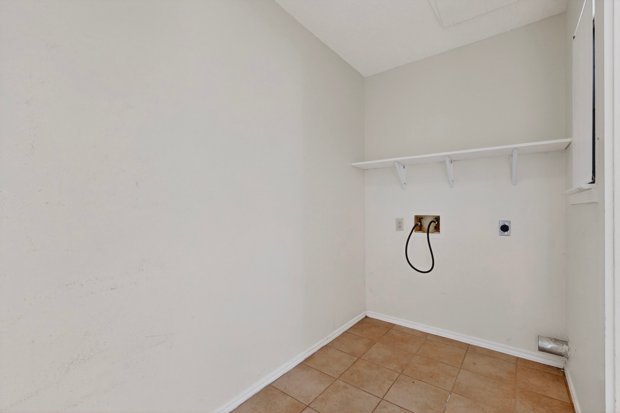 12800 Old San Antonio Road, Unit A Manchaca, TX 78652 - Photo 22 of 28 Utility closet/laundry room in carport