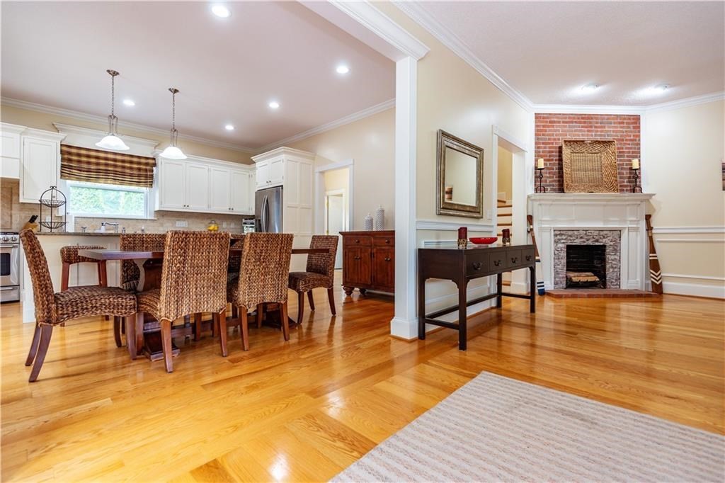 7 Gibson Avenue, Unit 7 Narragansett, RI 02882 - Photo 5 of 27 a view of a dining room with furniture window and wooden floor